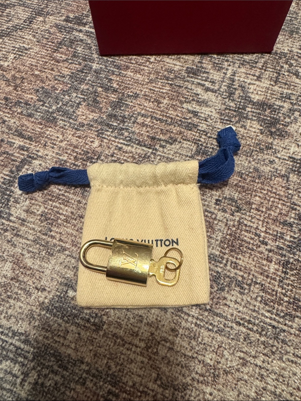 Louis Vuitton Gold Padlock with Key on Drawstring Pouch
